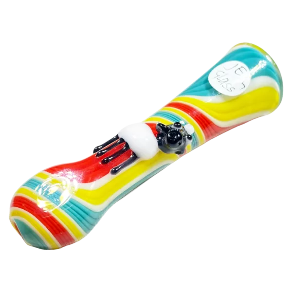 Colorful swirled glass pipe with a black figure on top, holding a white pipe. The figure appears to be a bat wearing a black hat. Ideal for smoking enthusiasts who appreciate unique glass art.