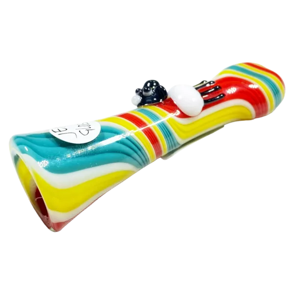 colorful, swirled glass pipe with a small black cat on top. The pipe has a round, swirled design and the cat is looking up with its eyes closed. The background is white with black spots.