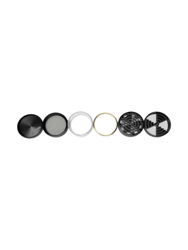Set of four circular metal objects with smooth surfaces and different sizes arranged in a symmetrical pattern.