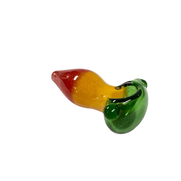 curved glass pipe with a colorful, abstract design. It is marketed as the Tucan Fruit Loop Hand Pipe - VS8. It is sitting on a green surface.
