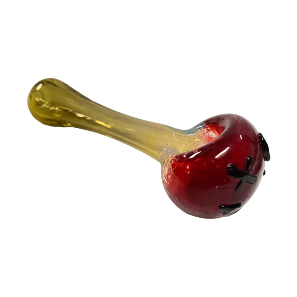 red glass pipe with a black bowl and clear stem, featuring a stitch design with a black outline on the side.