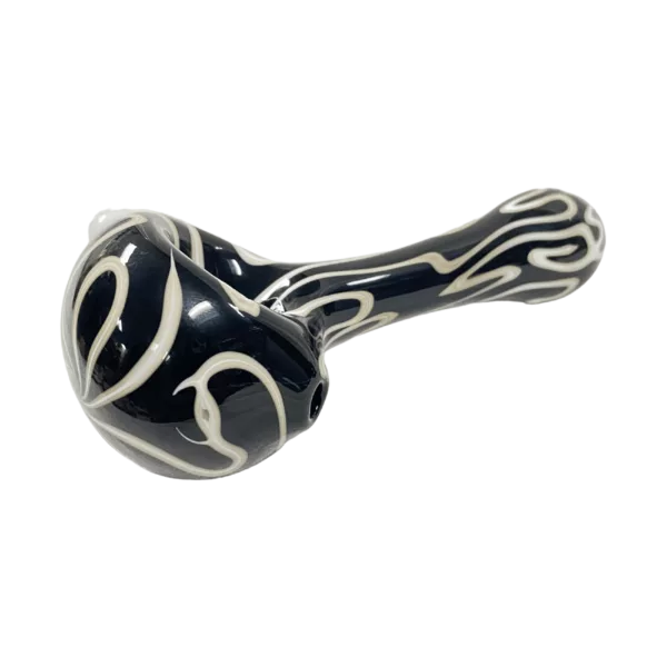 Wayne Wagoner's Black & White Squiggle glass pipe features a curved design with white and black swirls, a small bowl and stem with a ring.