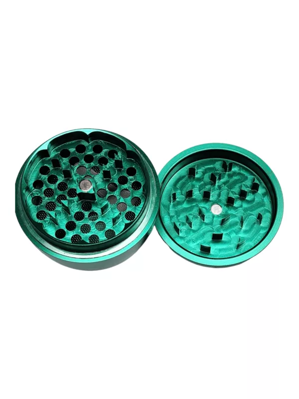 This green metal Egg Grinder-BVGA156 is a circular herb grinder with a small hole in the center, designed for efficient and convenient herb grinding.