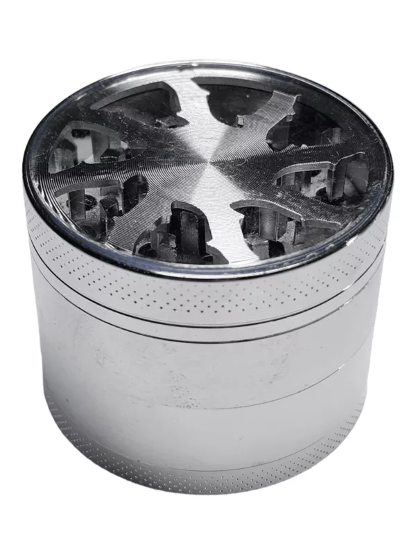 Silver metal grinder with a window on top and 5 small holes for rolling and smoking tobacco leaves.
