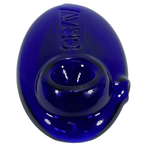 A blue glass ashtray with a bowl-shaped indentation and spiral patterns, featuring a small hole with a ring around it.