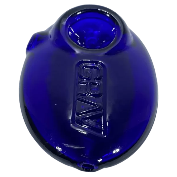 Decorative blue glass vase with small center hole. Round shape and smooth surface. Standalone object. Pebble Spoon - Grav 2 brand.